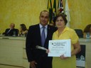 Vereador Claudevi Oliveira da Silva Junior e a homenageada Sra. Maria Izabel da Silva Rizzi - Paróquia São Francisco de Assis